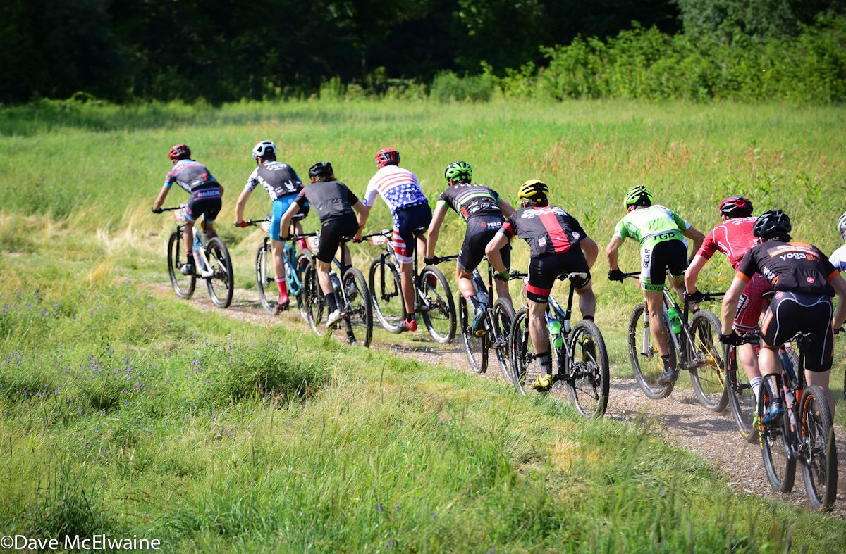 Cole Oberman (RareDiseaseCycling.org) leading the pro men out onto the course