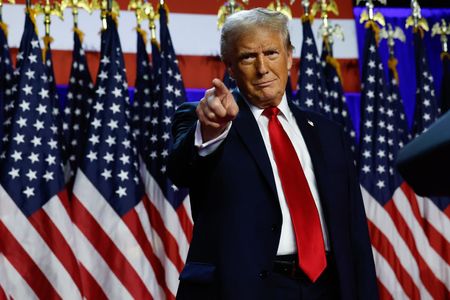 US presidential election winner Donald Trump arrives to speak during an election night