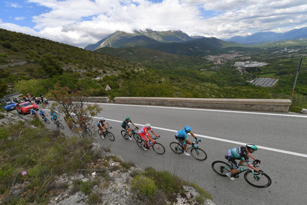 The peloton pass through the countryside on stage 7