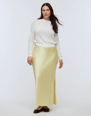 Madewell model in white top and butter yellow satin skirt