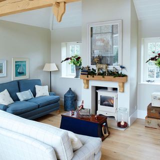 Country style sitting room with exposed beams