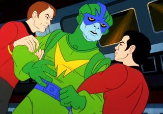 two human men in red jumpsuits wrestle a blue-skinned humanoid alien