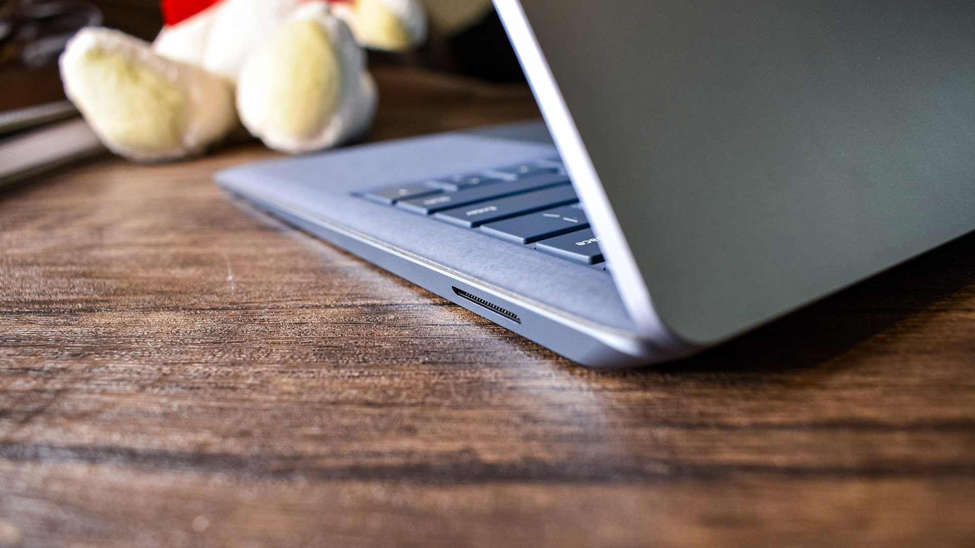 Surface Laptop 4 on a coffee table from the side