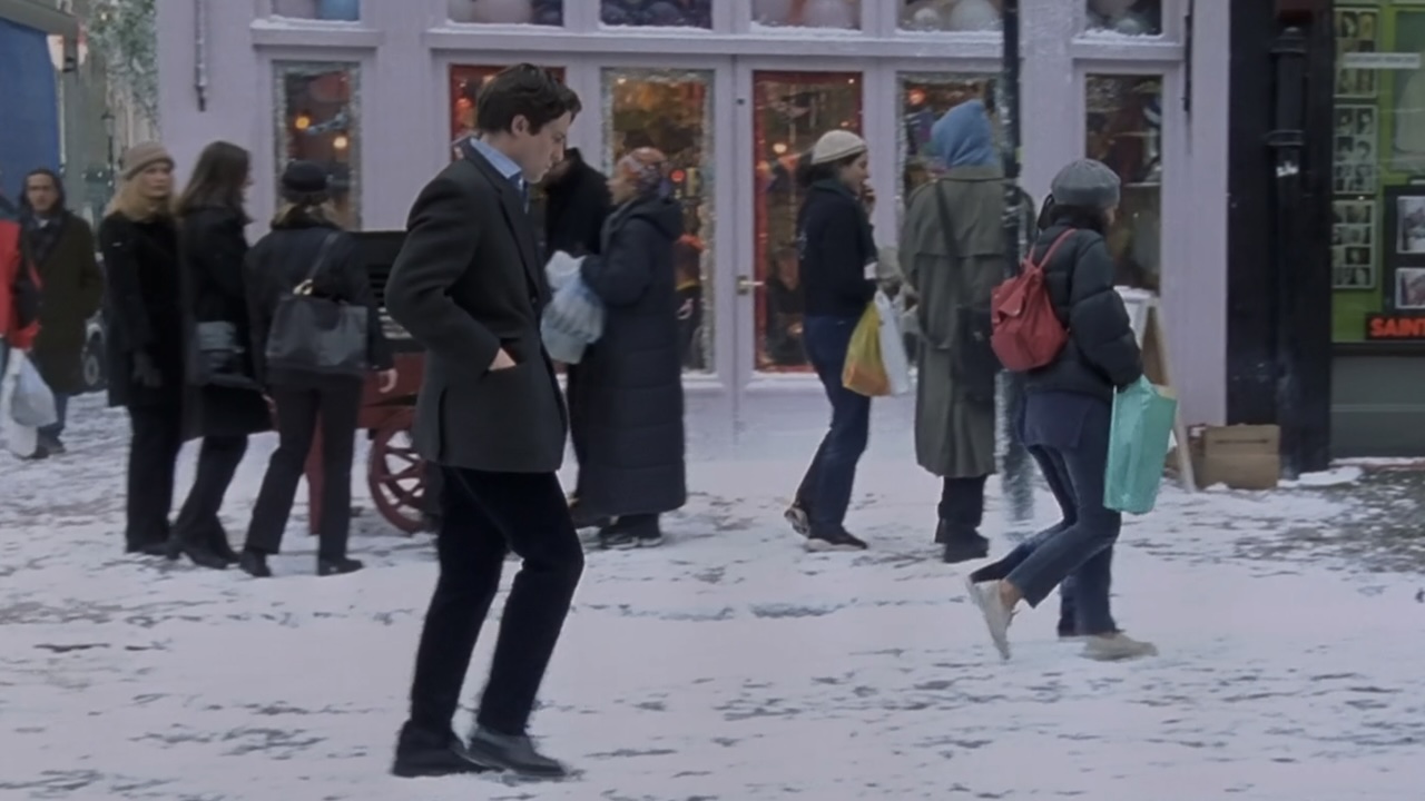 Will walking down a snowy street in Notting Hill