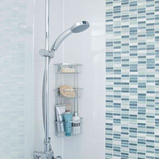 bathroom with white tiles and shower