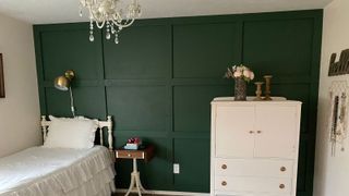 Creating a DIY wooden accent wall painted in green