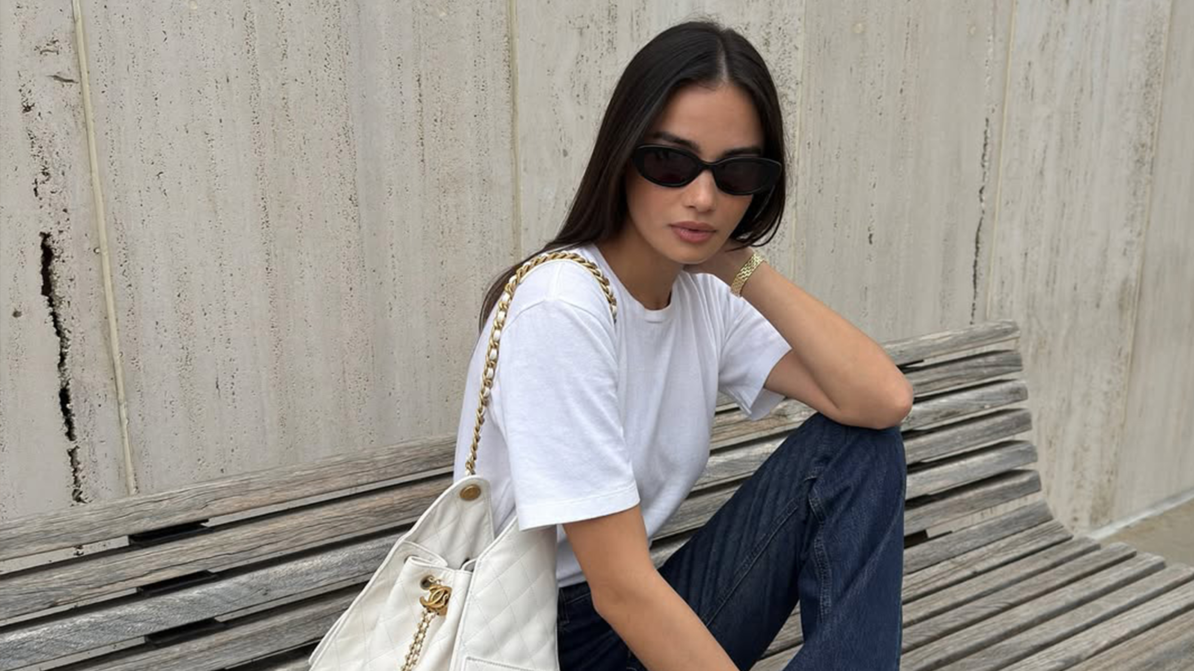 Kelsey Merritt wearing the Chanel 25 Handbag