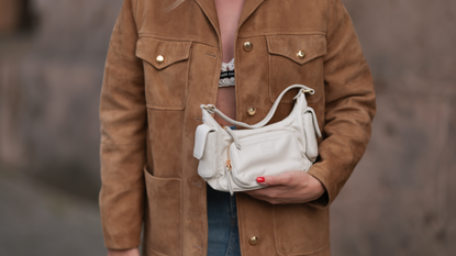 Sonia Lyson wearing a Bottega Veneta pouch and heels, Fendi shades News  Photo - Getty Images