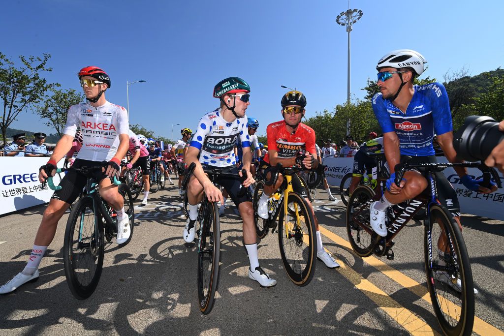 GUILIN CHINA OCTOBER 16 LR Louis Barre of France and Team ArkeaSamsic White best young jersey Frederik Wandahl of Denmark and Team BORAHansgrohe Polka dot Mountain Jersey Milan Vader of The Netherlands and Team JumboVisma Red Leader Jersey and Dries De Bondt of Belgium and Team AlpecinDeceuninck Blue Sprint Jersey prior to the 4th GreeTour of Guangxi 2023 Stage 5 a 2096km stage from Liuzhou to Guilin UCIWT on October 16 2023 in Guilin China Photo by Tim de WaeleGetty Images