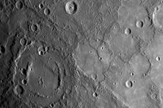 The double-ringed crater on Mercury pictured in the lower left of this image appears to be filled with smooth plains material, perhaps volcanic in nature. The MESSENGER spacecraft took this image during its closest approach to Mercury on Jan. 14, 2008 usi