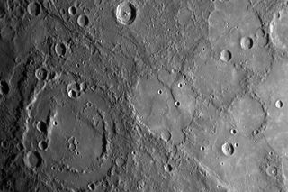 The double-ringed crater on Mercury pictured in the lower left of this image appears to be filled with smooth plains material, perhaps volcanic in nature. The MESSENGER spacecraft took this image during its closest approach to Mercury on Jan. 14, 2008 usi