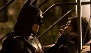 Batman Begins Christian Bale interrogates Cillian Murphy in the alley