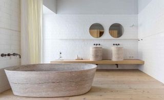 Bathroom with a large free standing bath