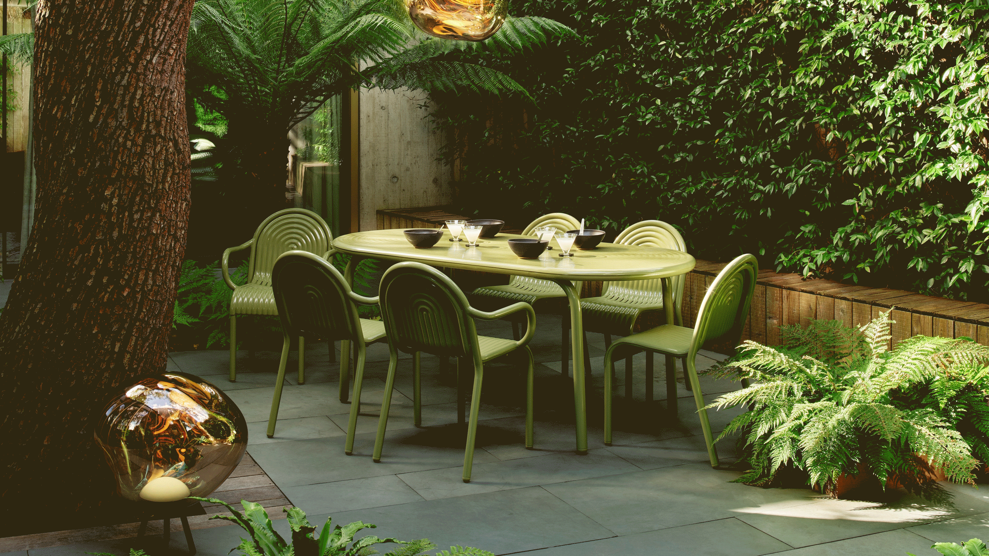 a revolving gif of modern outdoor spaces with standout furniture designs