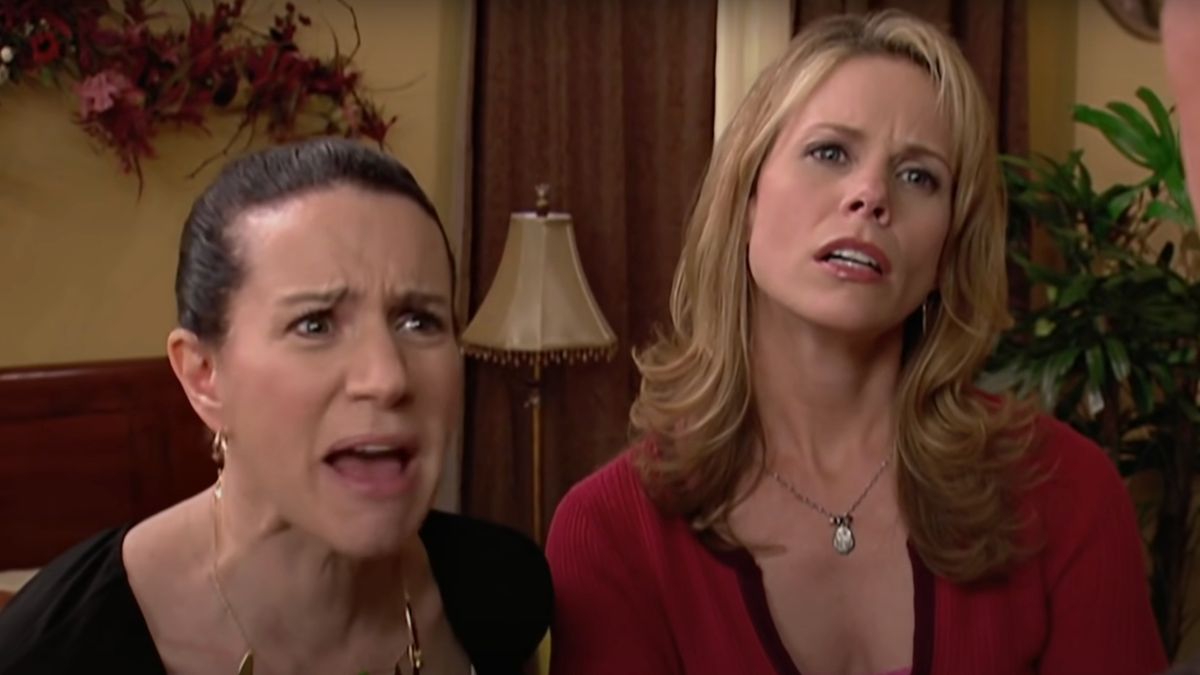 Susie Essman yells while Cheryl Hines watches unhappily on Curb Your Enthusiasm.