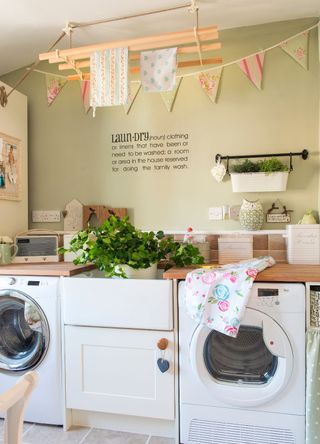 picture of a laundry room with a washer and dryer