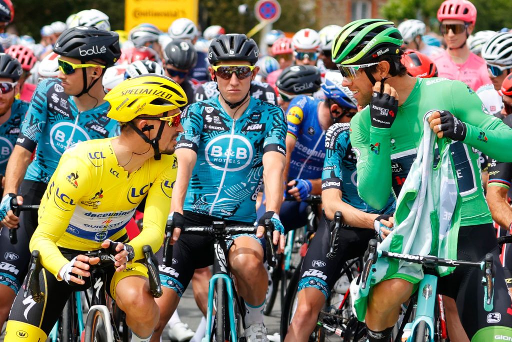 Team Deceuninck Quicksteps Julian Alaphilippe of France wearing the overall leaders yellow jersey L wait prior to the 2nd stage of the 108th edition of the Tour de France cycling race 183 km between PerrosGuirrec and Mur de Bretagne Guerledan on June 27 2021 Photo by Thomas SAMSON AFP Photo by THOMAS SAMSONAFP via Getty Images