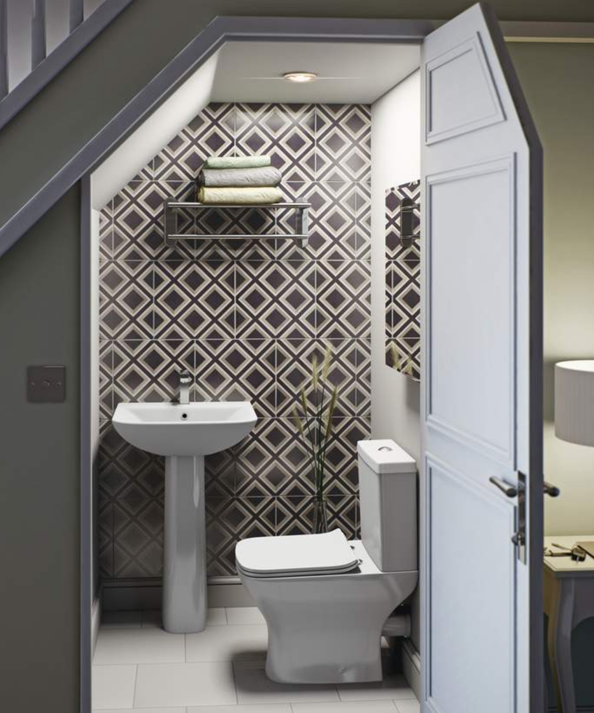 Understairs toilet idea with patterned feature wall