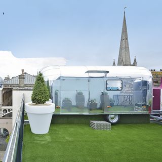 roof top guesthouse with green turf