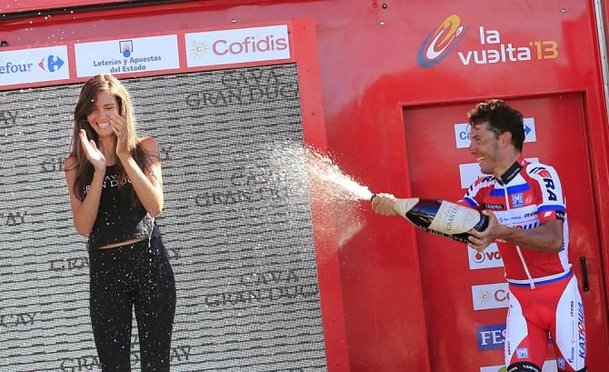 Joaquim Rodriguez (Katusha) rudely soaks the podium hostess after his stage win