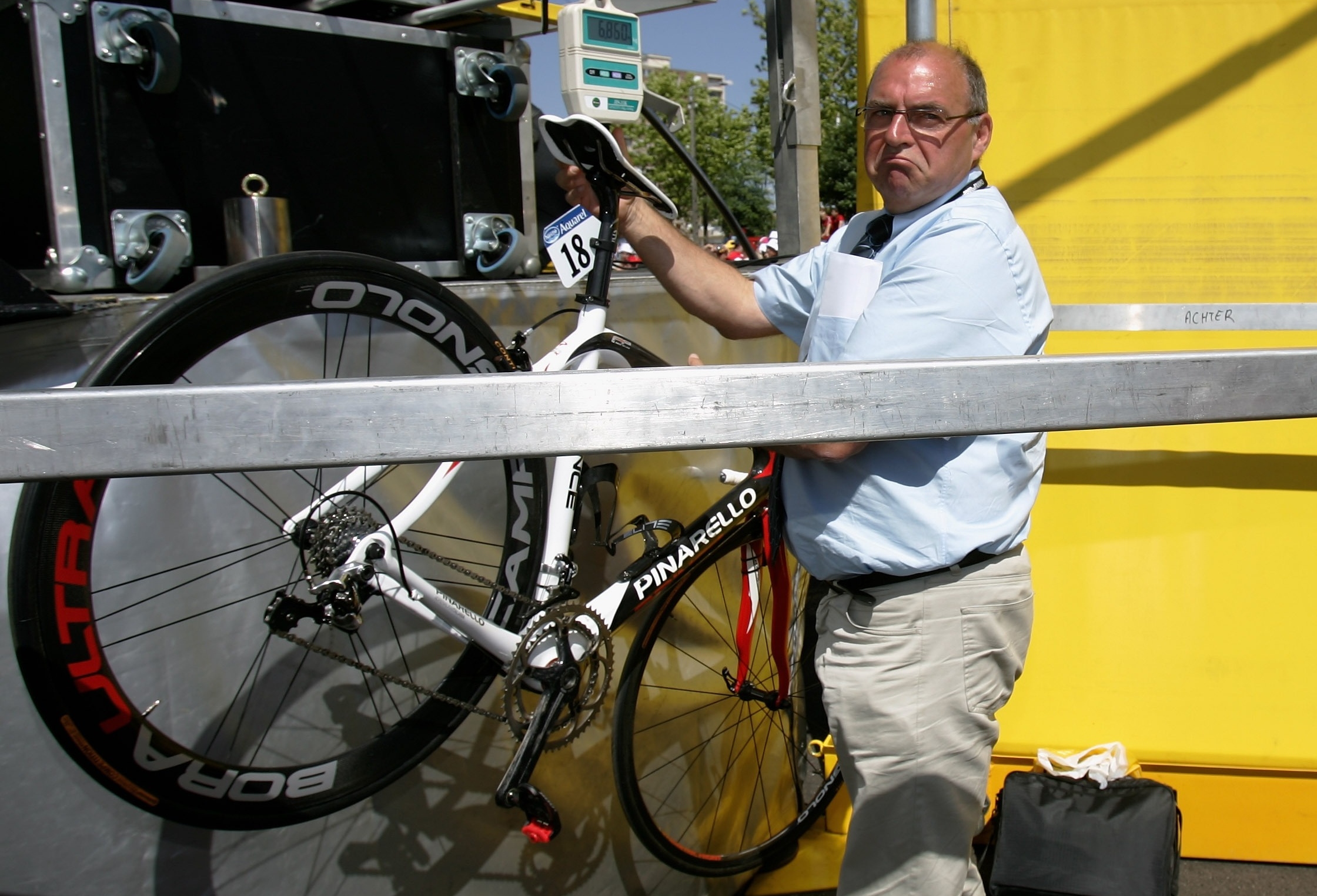 A bike is weighed by a UCI official in 2007