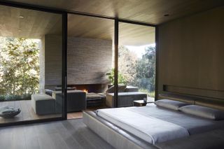 bedroom ideas with access to outside through big glass sliding doors