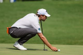 Thomas Detry lines up a putt