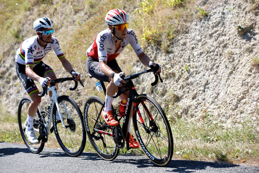LAGNIEU FRANCE AUGUST 10 LR Julian Alaphilippe of France and Team QuickStep Alpha Vinyl and Rmy Rochas of France and Team Cofidis compete in the chase group during the 34th Tour de lAin 2022 Stage 2 a 144km stage from SaintVulbas to Lagnieu TDA22 on August 10 2022 in Lagnieu France Photo by Bas CzerwinskiGetty Images