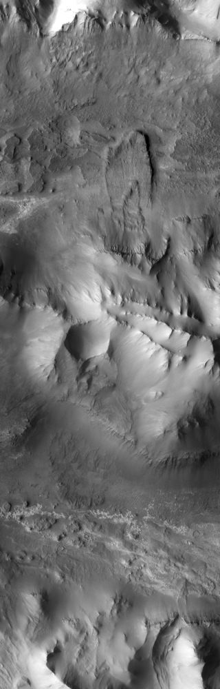 The central ridge of the Mars canyon Ius Chasma, captured by the Mars Odyssey spacecraft.