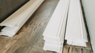 Lengths of MDF skirting board