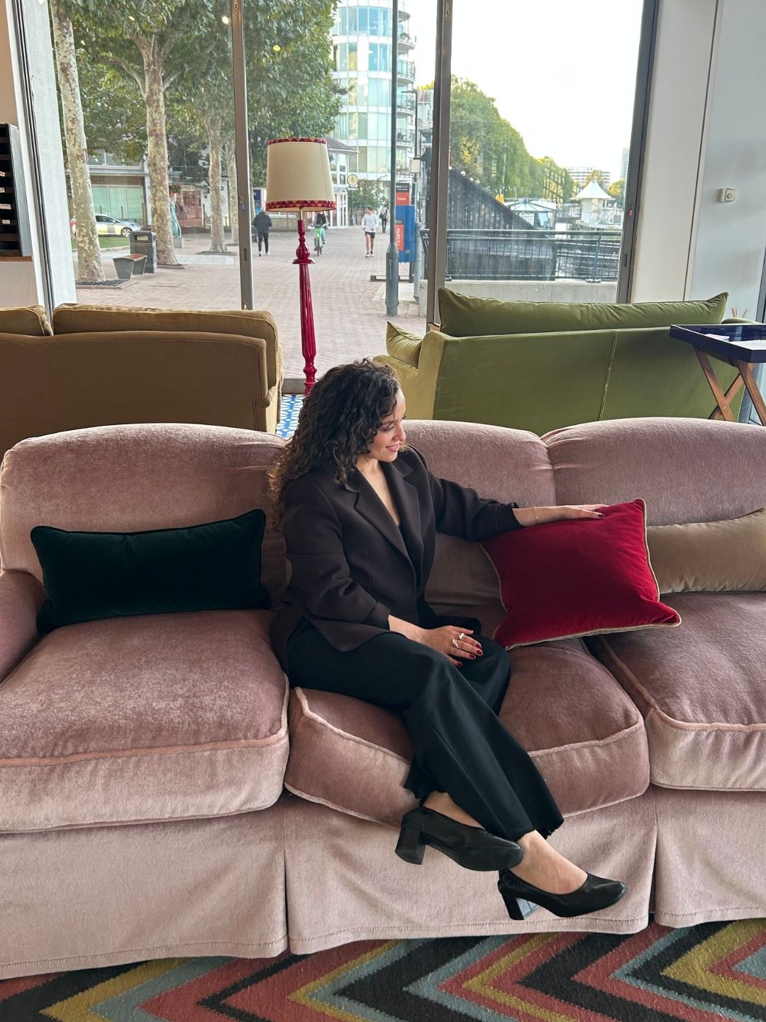 Interior stylist seated on the Lenny sofa in Heather Mohair Velvet.