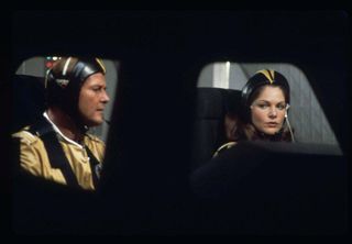 James Bond and Holly Goodhead sport soft space helmets in "Moonraker," the 1979 Bond film.