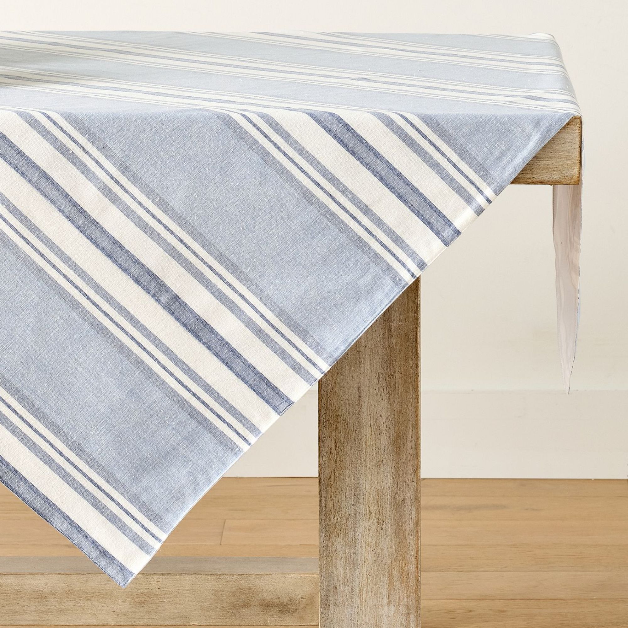 Blue and white stripe table throw