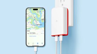 The Twelve South PlugBug 120W wall charger plugged in next to an iPhone showing the charger's location in Find My