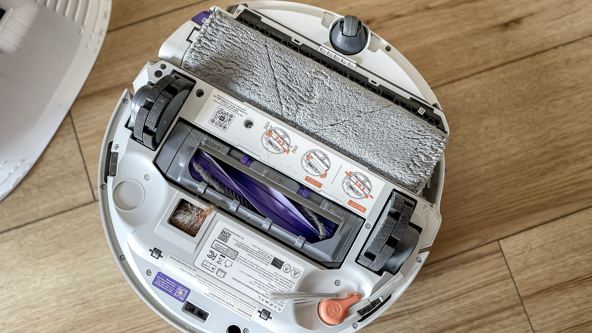 The underside of a Narwal Freo 20 robot vacuum