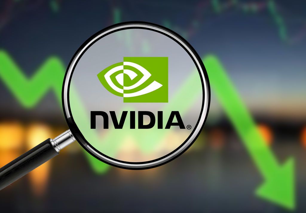 Concept image showing Nvidia shares falling on a chart behind a magnifying glass over the Nvidia logo in the foreground