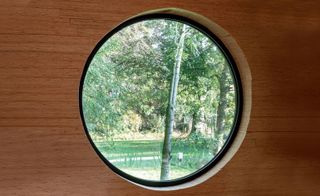 View of garden from circular window