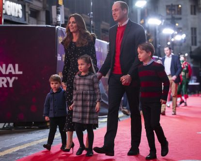 Prince William, Duke of Cambridge and Catherine, Duchess of Cambridge with their children, Prince Louis, Princess Charlotte and Prince George, attend a special pantomime performance at London's Palladium Theatre