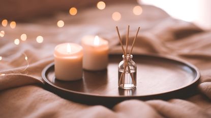 Cozy atmosphere with scented candles - stock photo