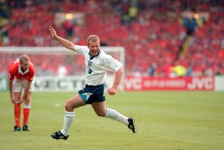 Alan Shearer celebrates after scoring for England against the Netherlands at Euro 96.