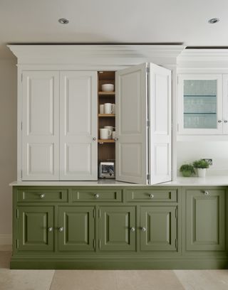 a two tone painted kitchen idea in green and white