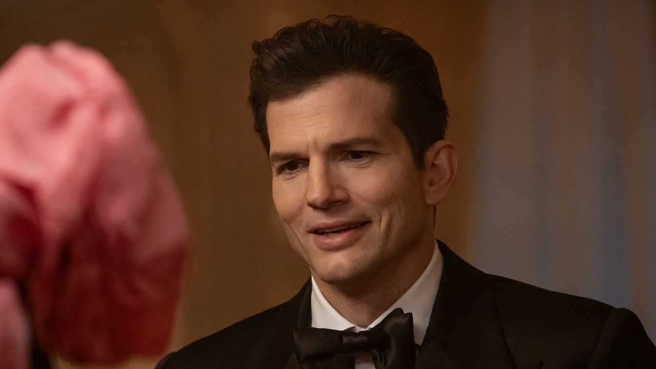 The Corporation in tux and smiling in The Beauty Season 1