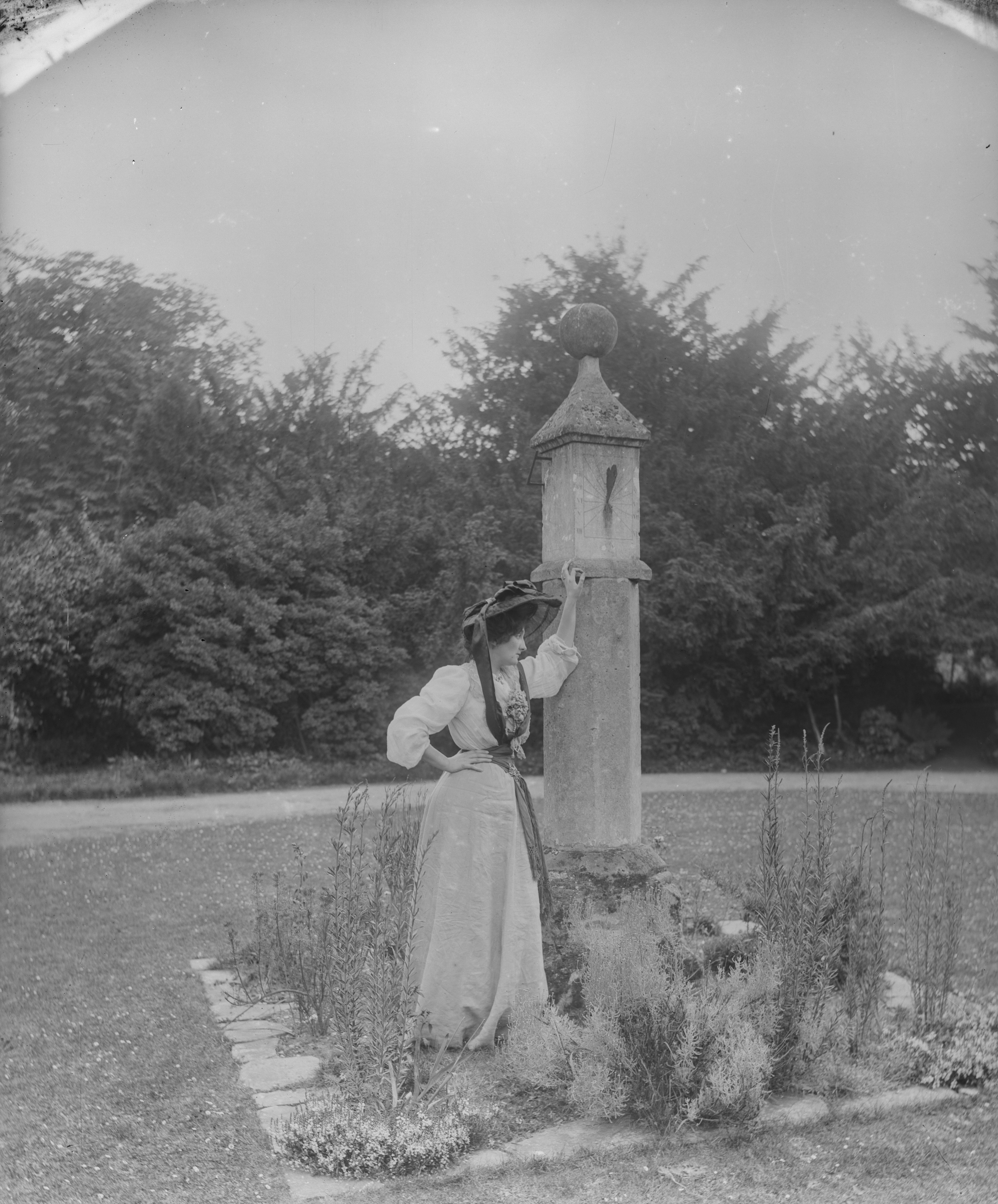 Woman and sundial