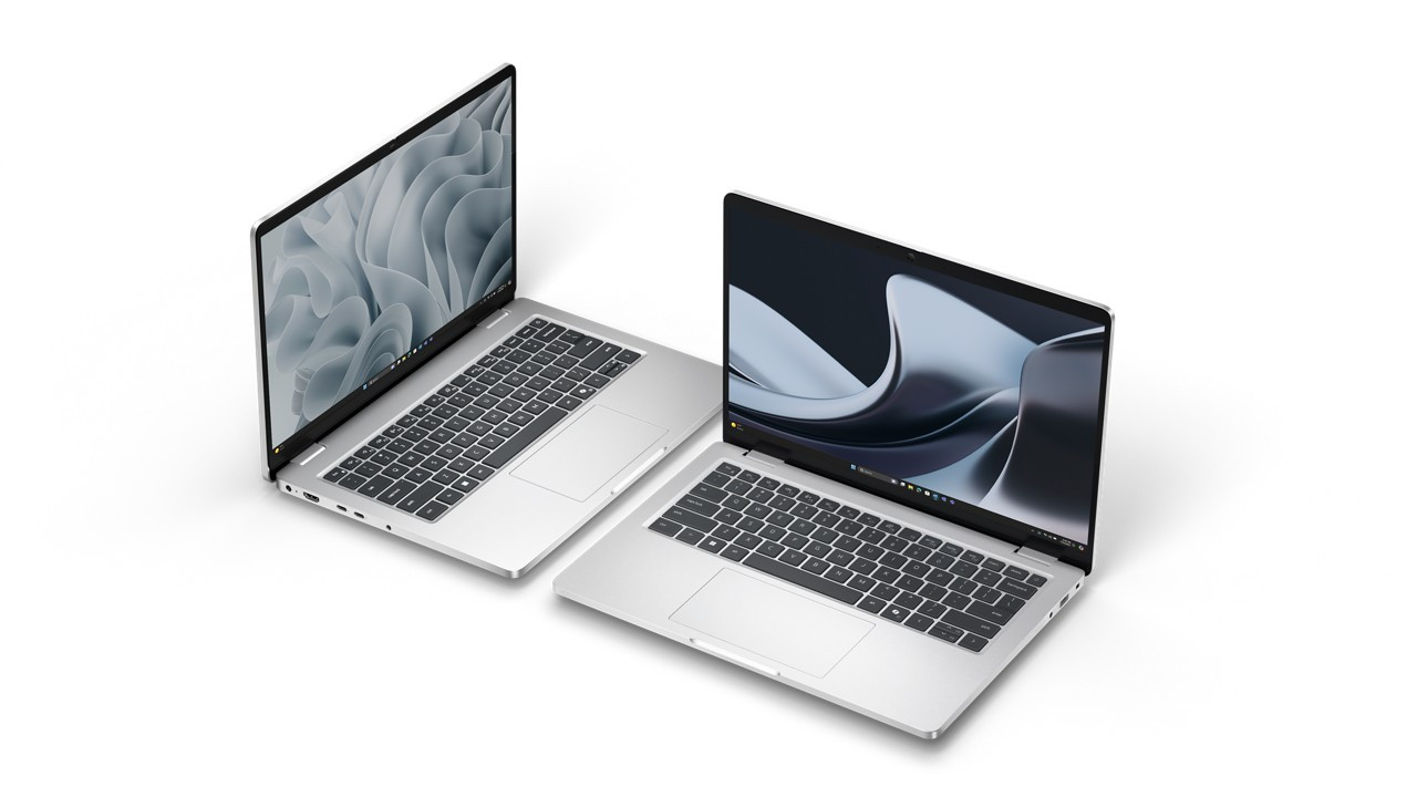 Dell Pro laptops side by side, open showing keyboard