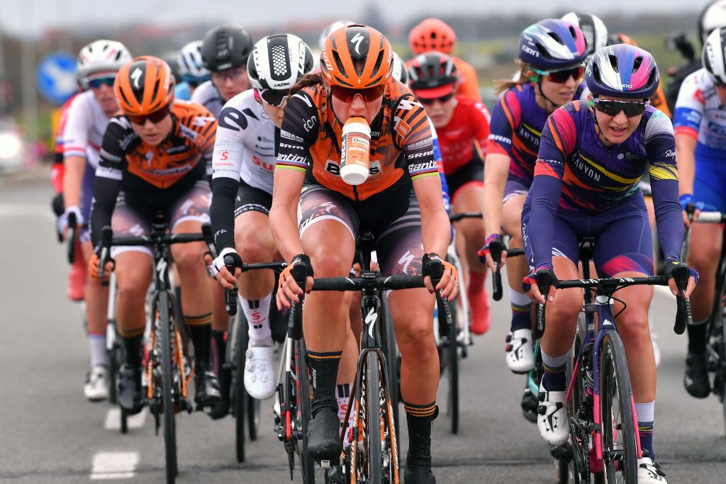 DE PANNE BELGIUM OCTOBER 20 Chantal Van Den Broek Blaak of The Netherlands and Boels Dolmans Cycling Team Refreshment Jessica Pratt of Australia and Team Canyon Sram Racing during the 3rd Driedaagse Brugge De Panne 2020 Women Classic a 1563km race from Brugge to De Panne AG3daagse on October 20 2020 in De Panne Belgium Photo by Luc ClaessenGetty Images
