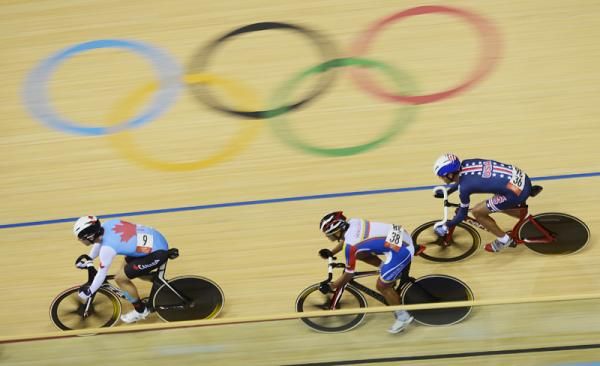 Zach Bell (Canada), Carlos Daniel Linarez Zambrano (Venezuela) and Bobby Lea (USA) in action in the omnium scratch race.