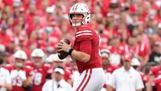 Graham Mertz #5 of the Wisconsin Badgers looks to pass during the first half against the Penn State Nittany Lions at Camp Randall Stadium on Sept. 4, 2021 in Madison, Wisconsin.