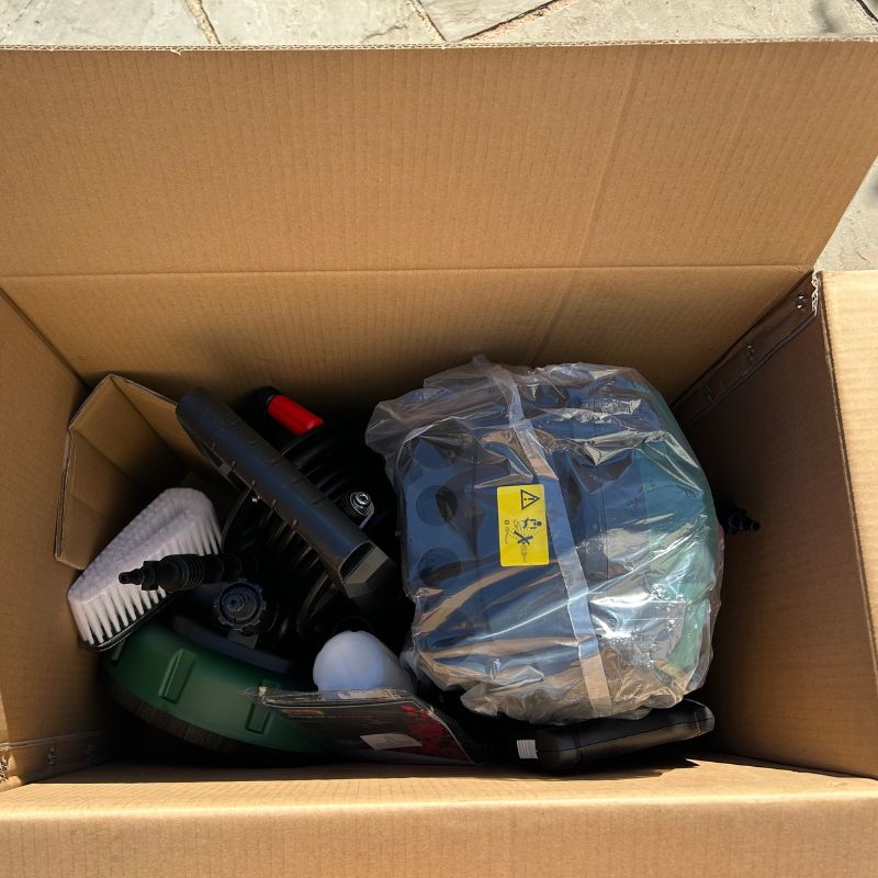 Webb WEPW2200 165 Bar Pressure Washer inside the box with packaging