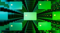 Consumer banking concept image showing rows of green credit cards in a digitized environment.