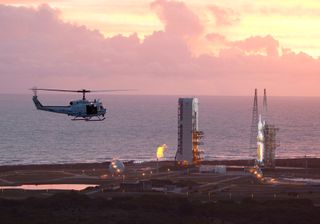 A United Launch Alliance Delta 4 Heavy rocket stands ready to launch NASA's first Orion deep-space capsule on its debut test flight in this view taken from a helicopter flying over Cape Canaveral Air Force Station in Florida on Dec. 4, 2014. The rocket is